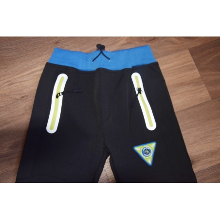 Jarní softshelové kalhoty Kugo kompas